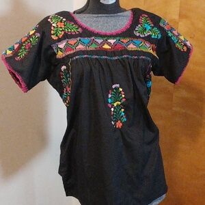 Hand Crafted colored and black embroidery blouse from Oaxaca